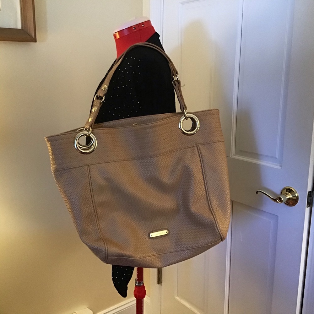 Steve Madden large shoulder bag in creamy gold color with gold accents.